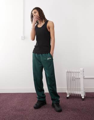 New Era New Era side stripe wide leg track pant in green