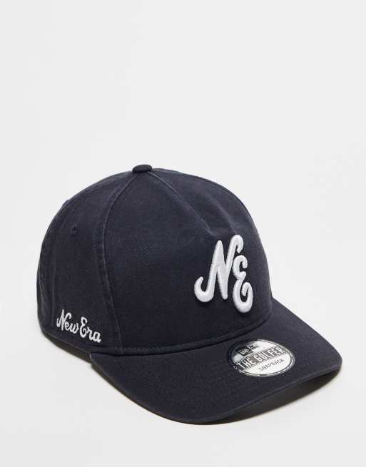 New Era – Svart, ostrukturerad golfkeps med textlogga