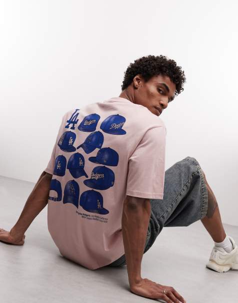 New Era - T-shirt met LA Dodgers-logo en grafische pettenprint op de achterkant in roze - view 1
