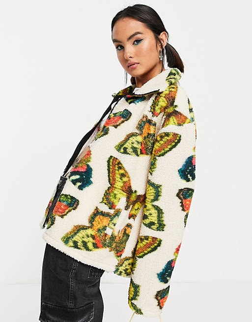 Women New Girl Order butterfly print borg jacket in off-white 