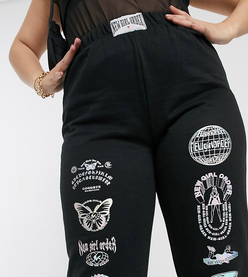 New Girl Order Curve - Ruimvallende joggingbroek met reflecterende print, combi-set-Zwart