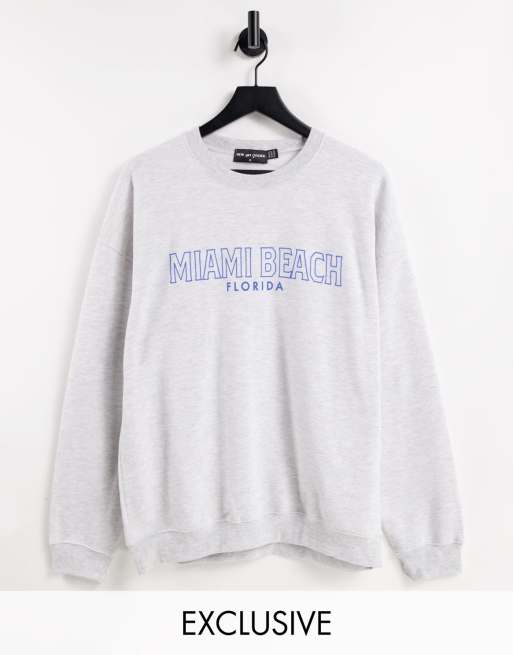 New Girl Order - Exclusives - Oversized sweatshirt met 'Miami Beach' print in grijs met wassing