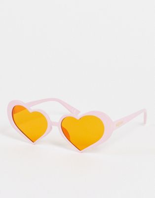 New Girl Order heart sunglasses in baby pink with orange tinted lens
