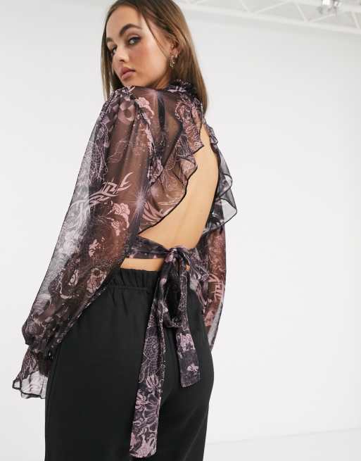 New Girl Order high neck mesh crop top with open back in tattoo graphic