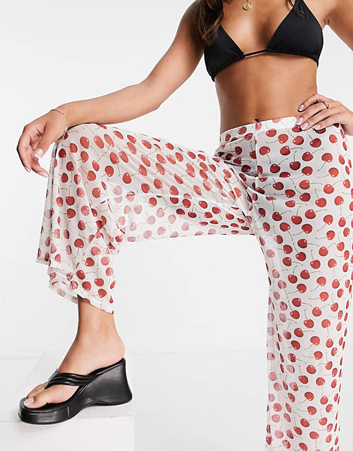  New Girl Order mesh beach trousers in cherry print 