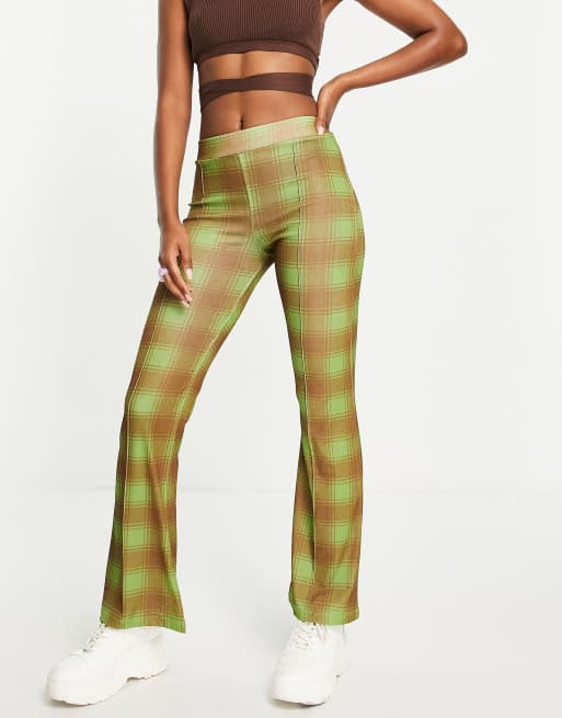 New Girl Order Radical Love flared pants in monogram print