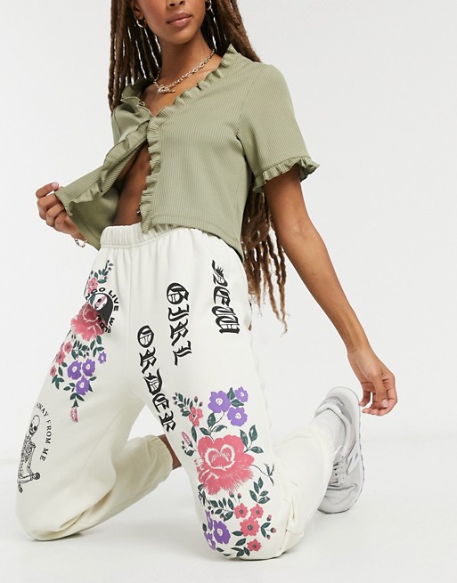 New Girl Order relaxed joggers in gothic floral print co-ord