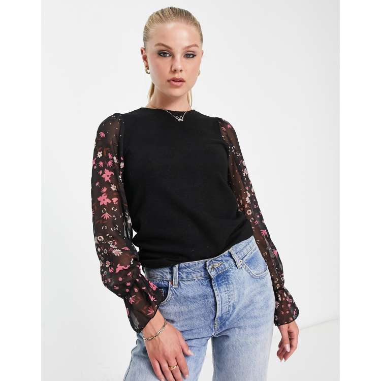 Sweater with outlet flowers on sleeve