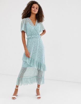 New Look – Blåmönstrad klänning i mesh med volangärm