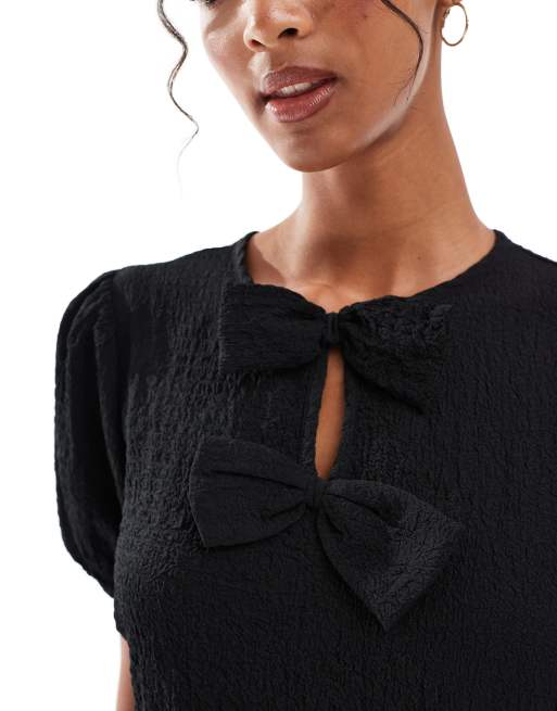 New Look bow front mini smock dress in black ASOS