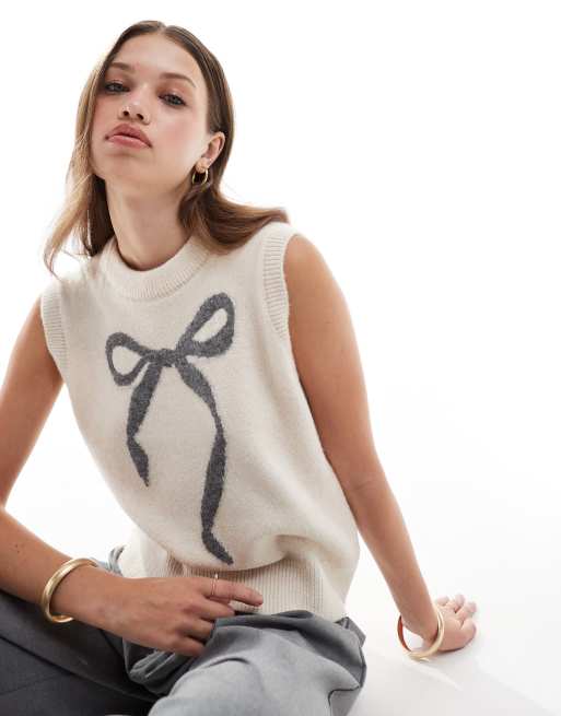 New Look bow knitted vest in cream ASOS