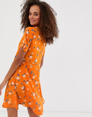 Look button down dress in orange print 