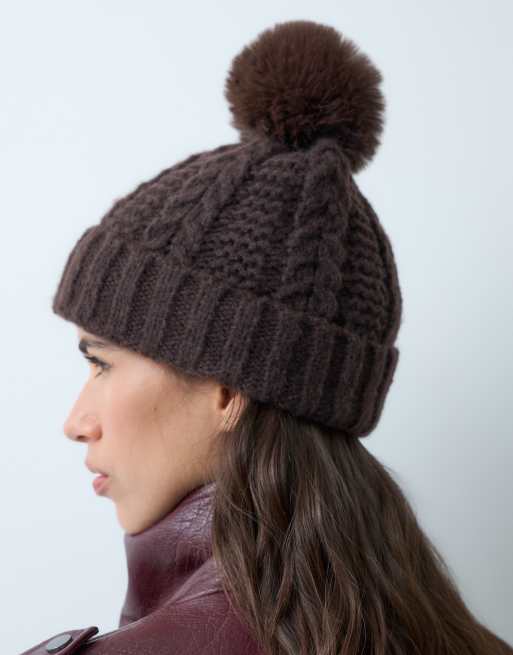 New Look cable beanie hat with faux fur pom pom in dark brown, 2 of 3