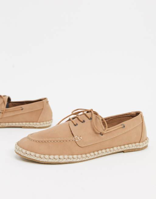 cream colored canvas shoes