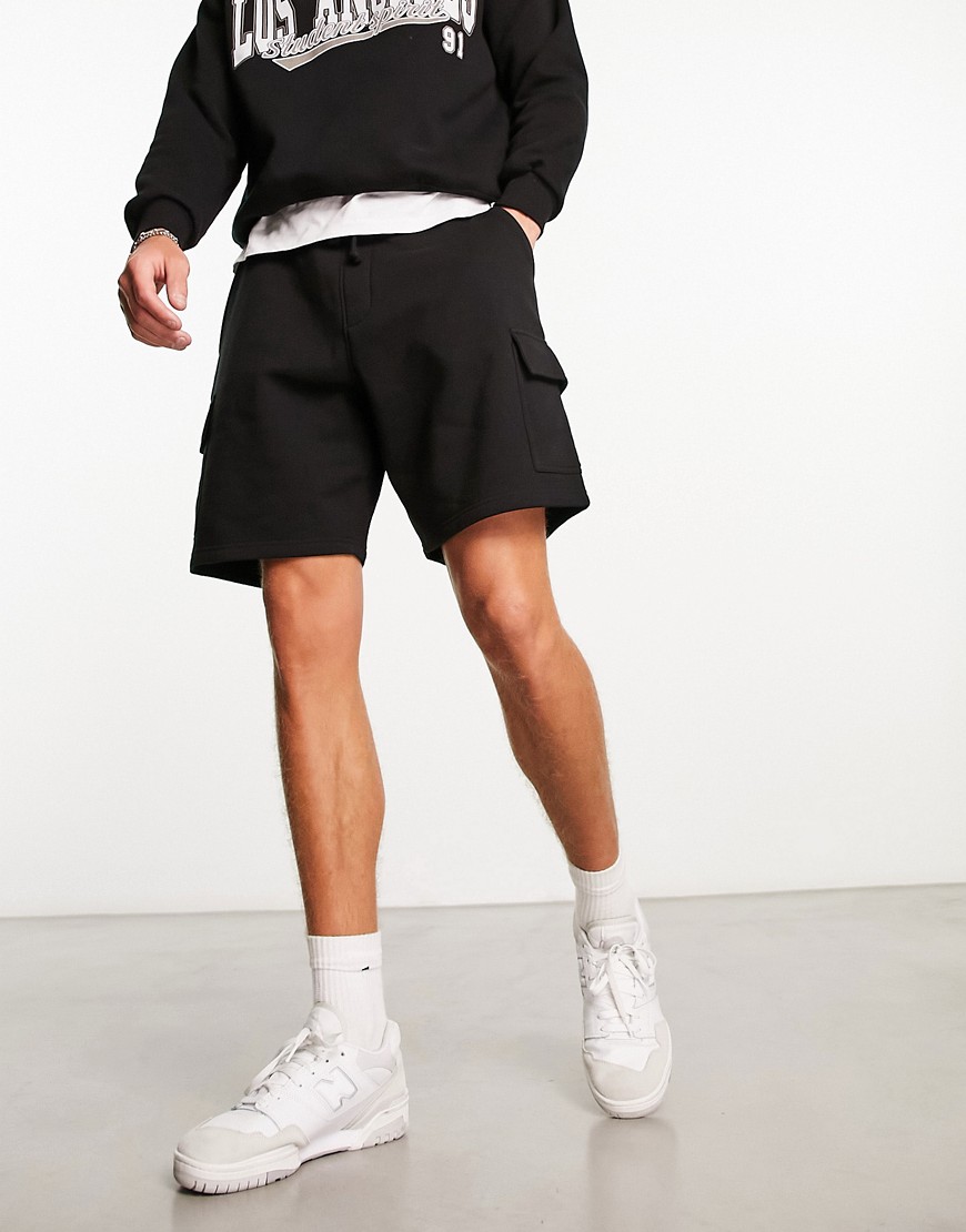 New Look cargo jersey shorts in black