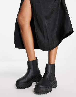 black boots trainers