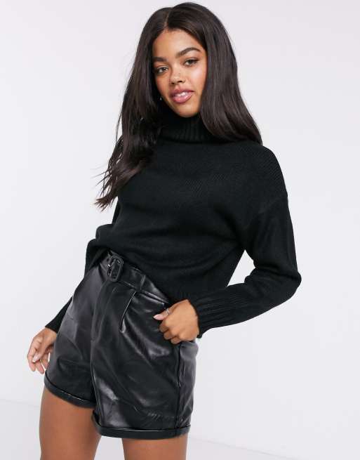 Chunky black roll store neck jumper