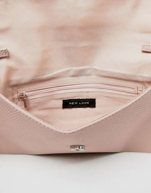 Baby pink clutch bag new online look