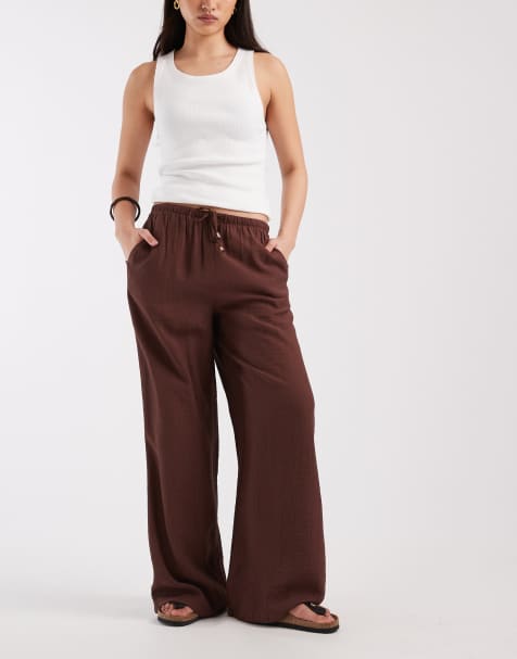 New Look crinkle wide leg trousers in brown - view 1