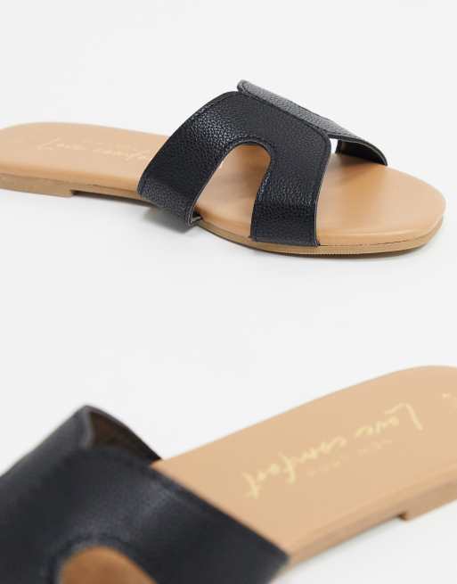 New Look cross strap sliders in black croc