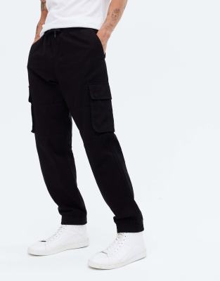 black cargo pants cuffed