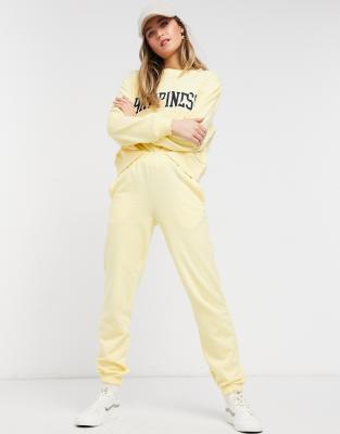 light yellow sweatsuit