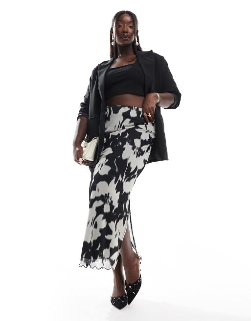 New Look Curve – Svart midikjol i mesh med suddigt blommönster