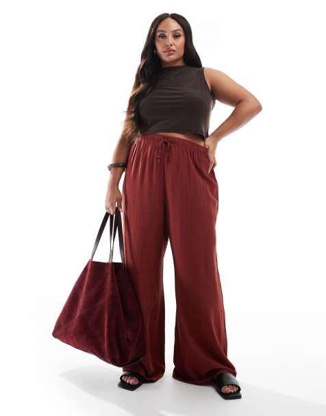 New Look Curve wide leg crinkle trousers in rust