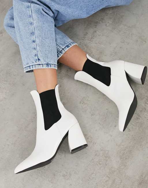 Curved heel boots best sale