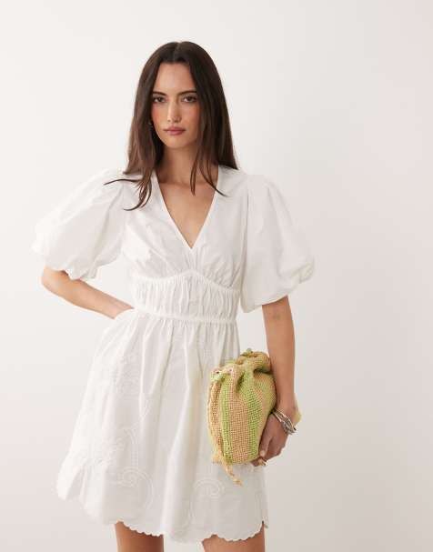 New Look puff sleeve shirred waist mini dress with cutwork detail in white