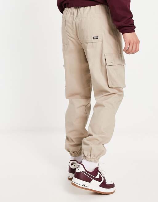 New Look D-ring cuffed slim cargo pants in tan