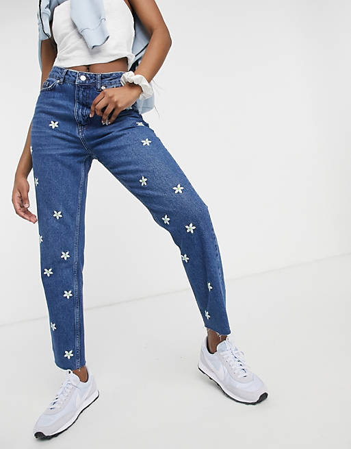 New daisy embroidered mom jeans in blue |