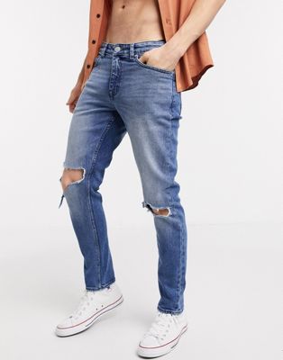 New Look – Enge Jeans mit Knierissen in Blau