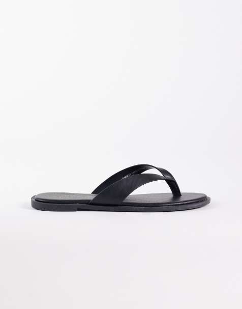 New Look faux leather flip flops in black - view 1