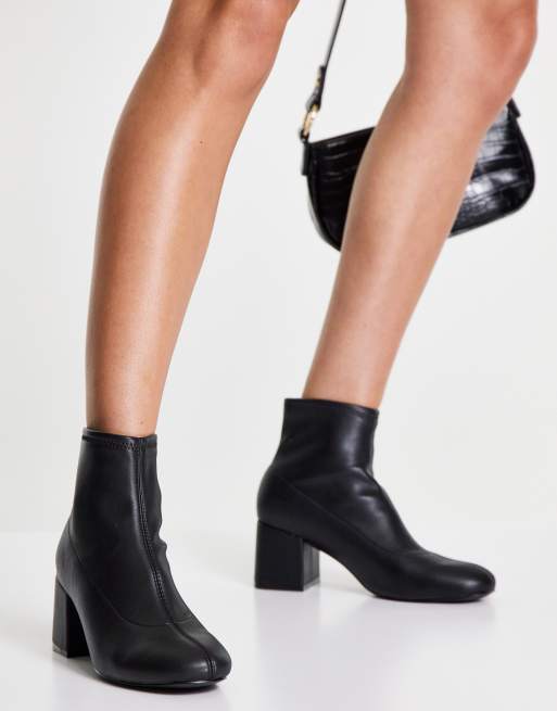 New Look faux leather heeled sock boot in black | ASOS