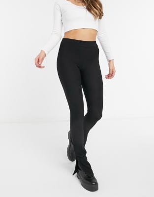 New Look - Geribbelde flare legging met split aan de zijkant in zwart | ASOS