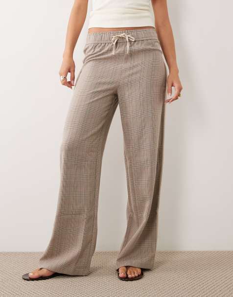 New Look - Geruite broek met wijde pijpen en biezen in bruin - view 1
