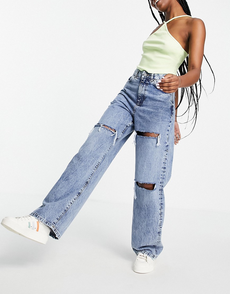 New Look - Gescheurde baggy jeans in middenblauw