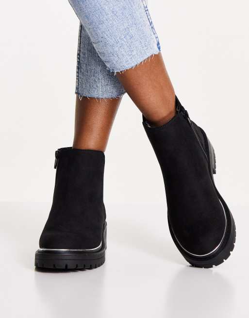 Chelsea boots shop with gold trim