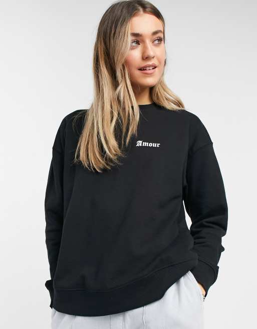 Black store slogan sweatshirt