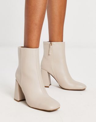  heeled ankle boots in off white