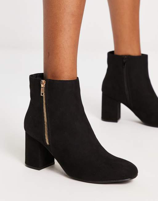 Black booties with cheap gold zipper