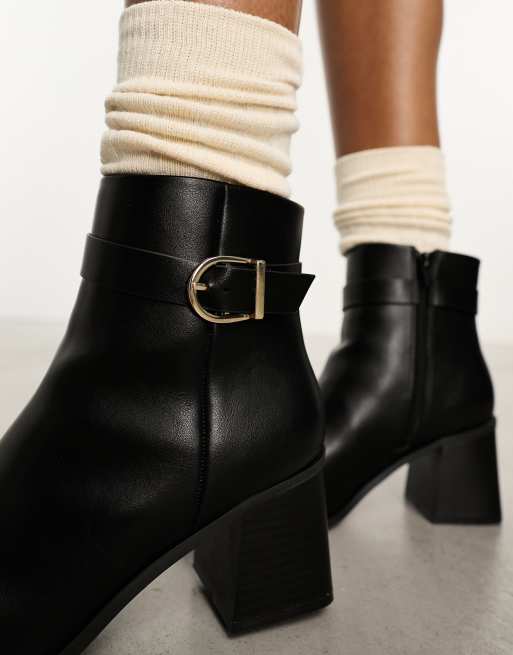 Black buckle heel store boots