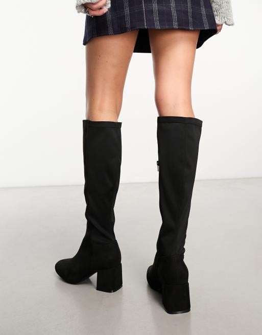 Over the knee outlet boots stretch back