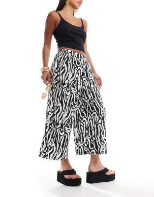 New Look - Hose in Schwarz mit Zebraprint und weitem Bein