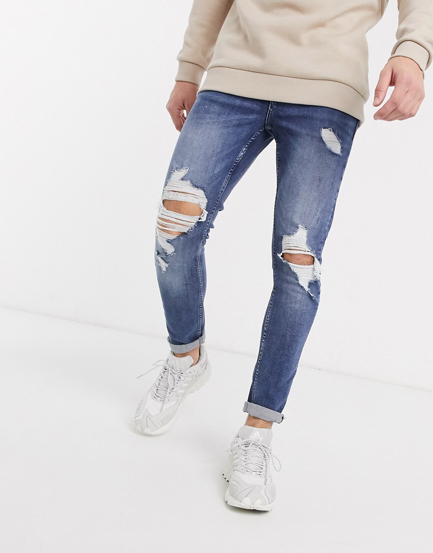 New Look - Jeans skinny strappati blu medio
