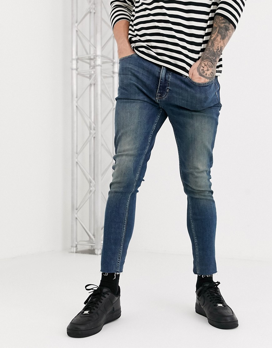 New Look - Jeans stretch skinny tagliati lavaggio blu scuro