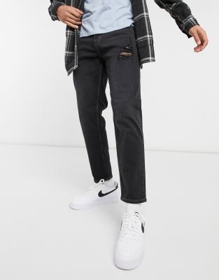 grey jeans with holes