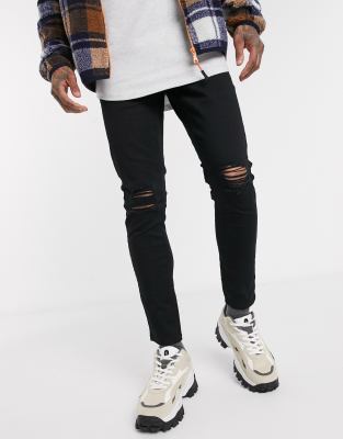 skinny jeans ripped at the knee