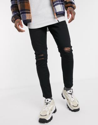 black knee cut jeans